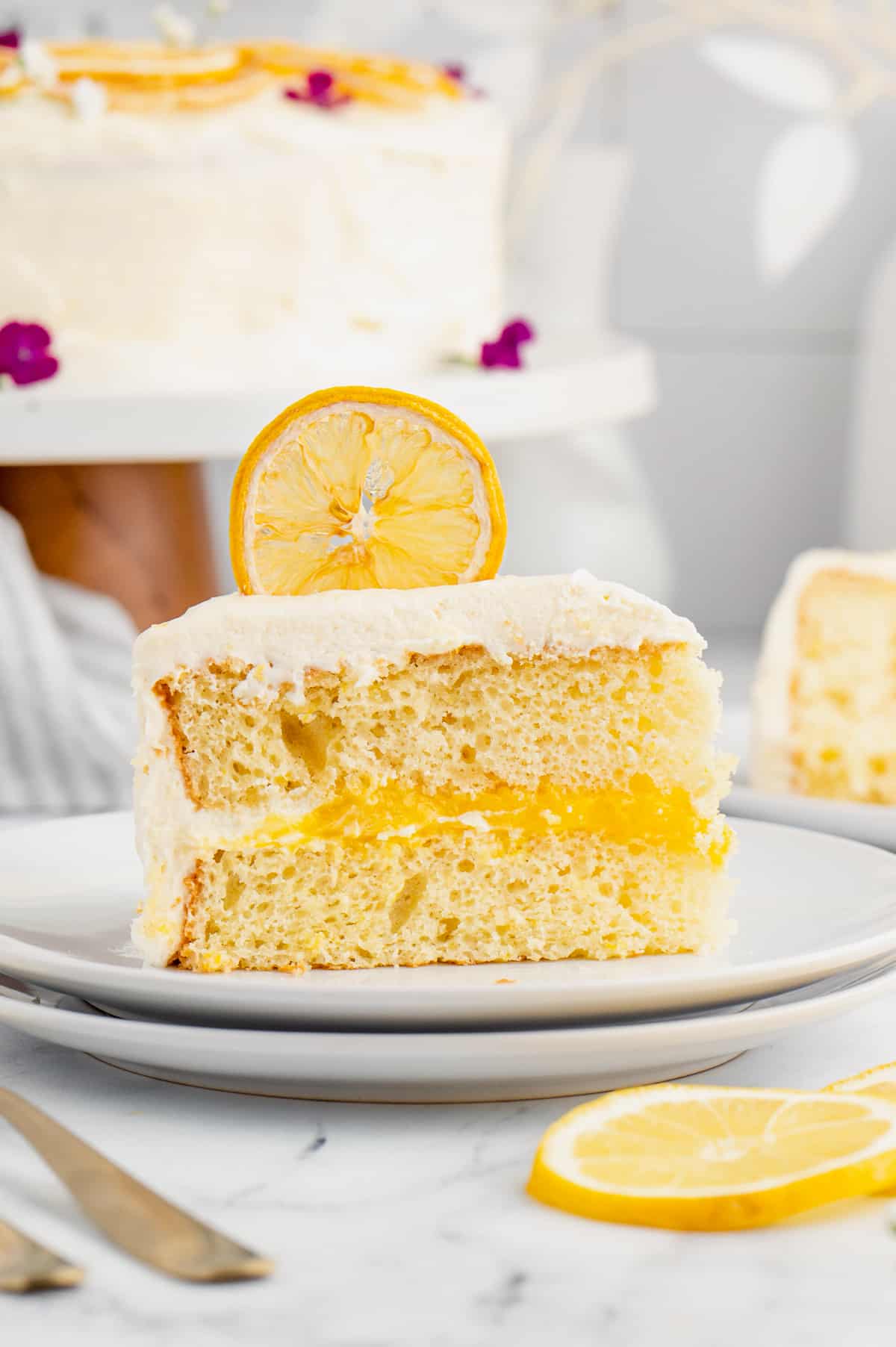Lemon layered cake with lemon curd filling and lemon frosting.