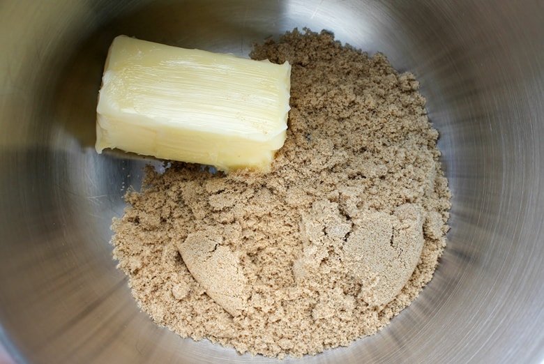 Butter and brown sugar in stainless steel bowl
