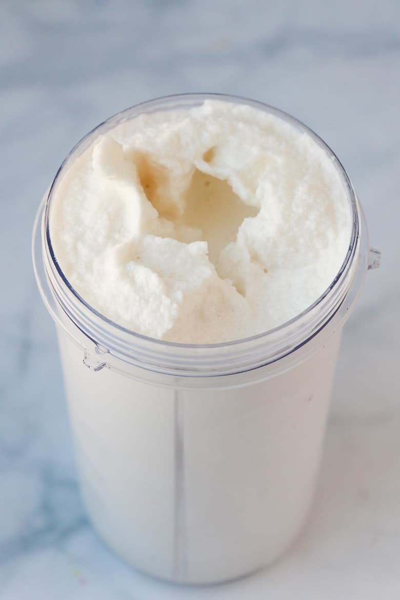 Nutribullet cup filled with freshly made vanilla bean frappe
