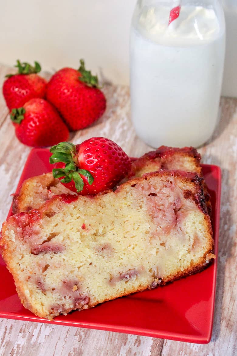 The Greek yogurt combines with bits of fresh fresh strawberries to give this homemade strawberry pound cake it's moist texture and delicious flavor.