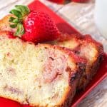 The Greek yogurt combines with bits of fresh fresh strawberries to give this homemade strawberry pound cake it's moist texture and delicious flavor.