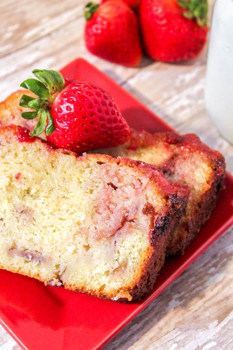 The Greek yogurt combines with bits of fresh fresh strawberries to give this homemade strawberry pound cake it's moist texture and delicious flavor.