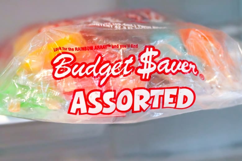 Bag of Budget Saver Assorted Popsicles on shelf in freezer