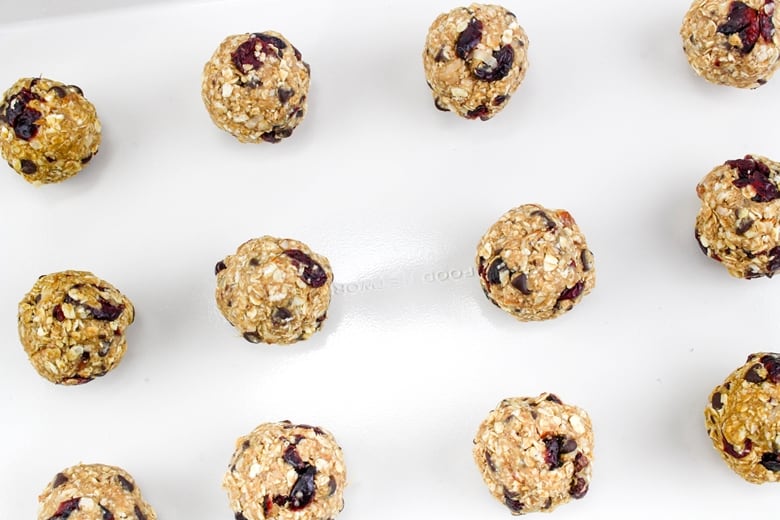 protein balls rolled on a baking sheet