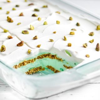 Pistachio layered dessert in 9 x 13 glass pan