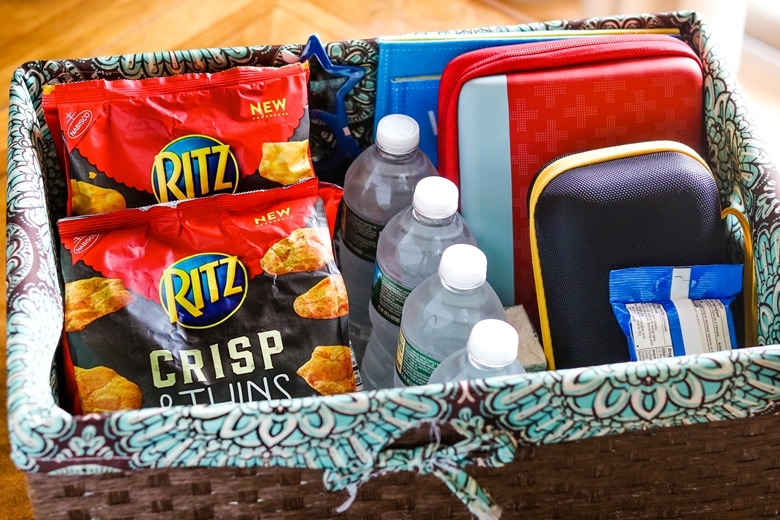 Road Trip Survival Kit packed with snacks, water, and more