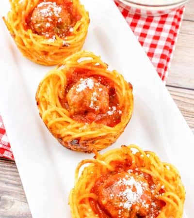 spaghetti and meatball cups on white serving platter