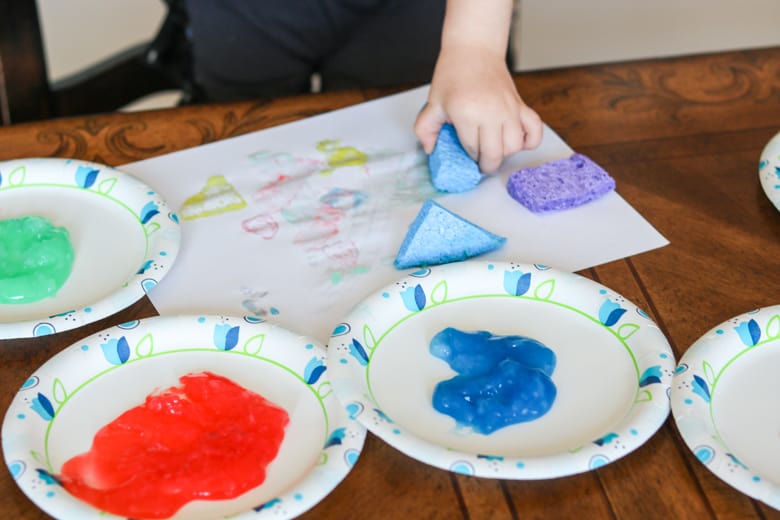 Toddler sponge painting on paper