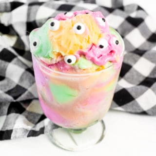 Rainbow sherbet topped with candy eyeballs