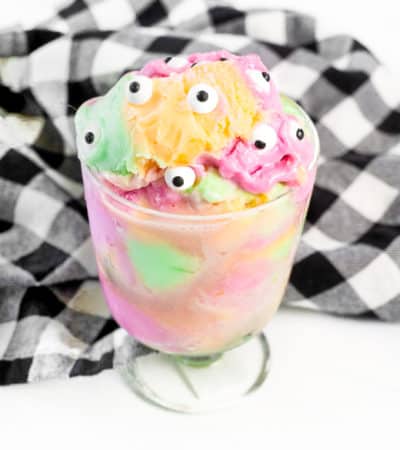 Rainbow sherbet topped with candy eyeballs