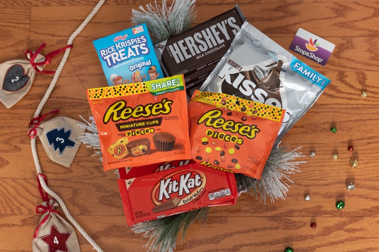 Candy Cabin Supplies: Rice Krispie Treats, Reese's Pieces, Reese's Peanut Butter Cups, Kit Kat Bars, Hershey bars, and Hershey Kisses.