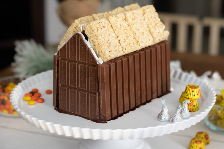 How to Make a Candy Cabin with kit kat and Hershey bar walls and a Rice Krispies Treat roof.