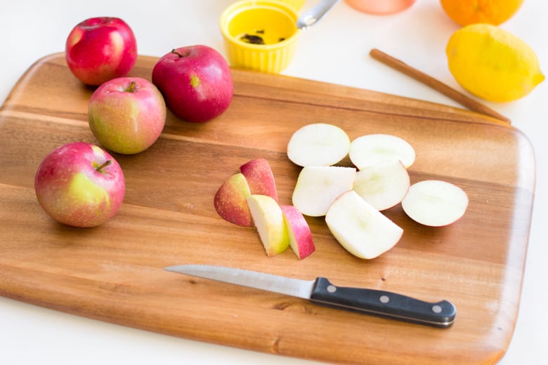 slice apples on cutting board