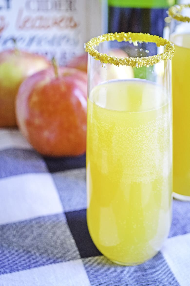 apple cider mimosas on table