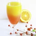 christmas mimosa recipe in cocktail glass