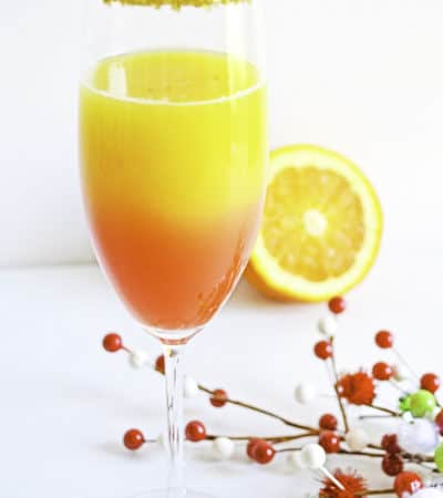 christmas mimosa recipe in cocktail glass