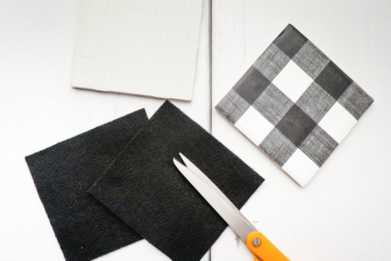 Felt squares trimmed to fit under tile coaster