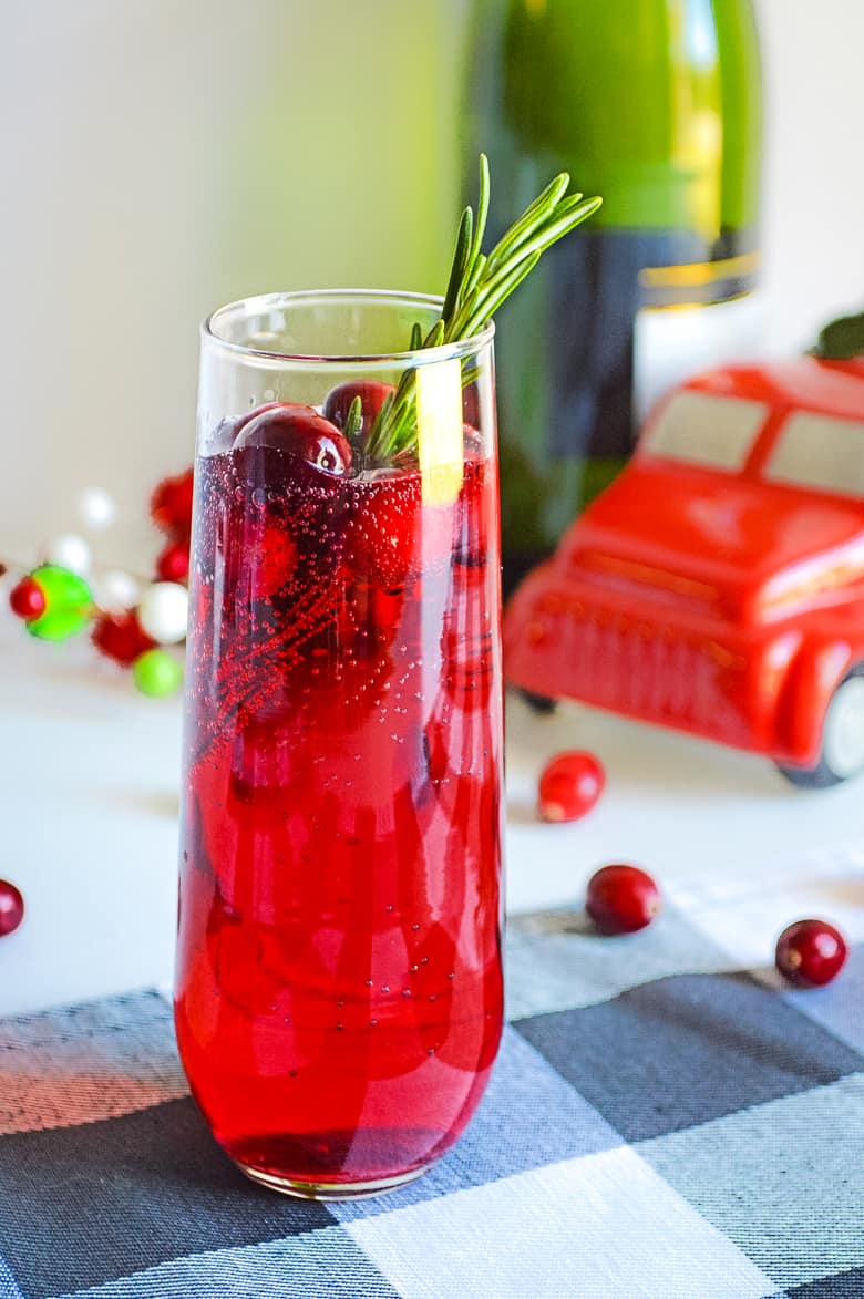 christmas cranberry mimosa sitting on a table