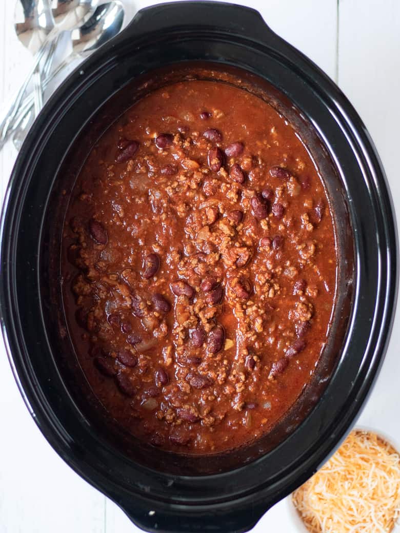Slow Cooker with beef chili in it.