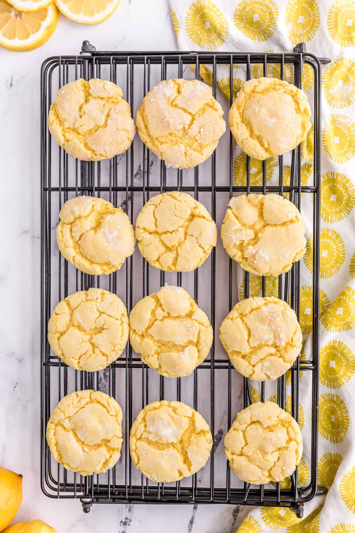 Lemon cake cookies on wire rack.
