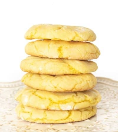 Lemon cookies stacked on top of one another in a pile