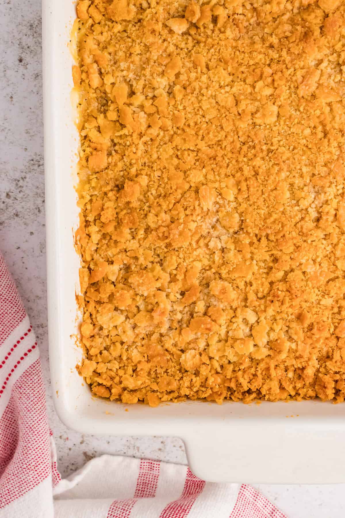 Ritz Cracker Chicken Casserole in white casserole dish.