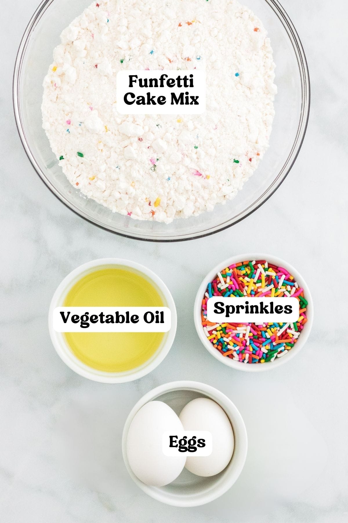 Funfetti cake mix, vegetable oil, rainbow sprinkles, and 2 eggs.
