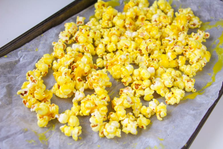 Yellow Popcorn on lined baking sheet