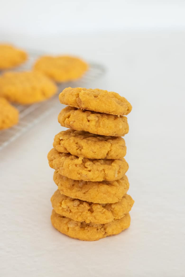 golden cookies stacked high