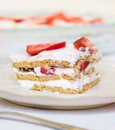 Slice of strawberry and cream layered dessert