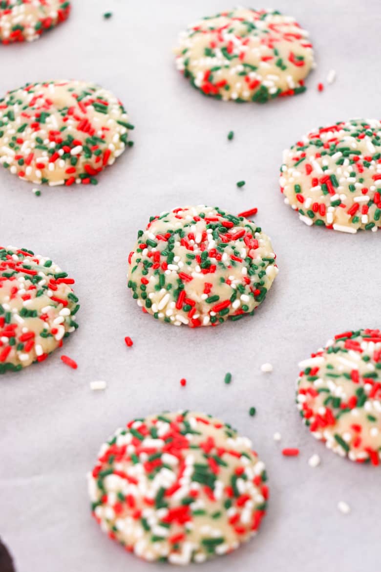 No Roll Sugar Cookies on baking sheet lined with parchment paper