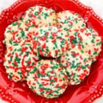 sugar cookies with sprinkles on red dish