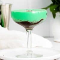 Grasshopper Cocktail layered in glass with chocolate sauce