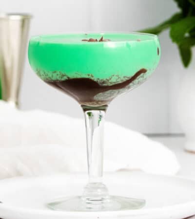 Grasshopper Cocktail layered in glass with chocolate sauce