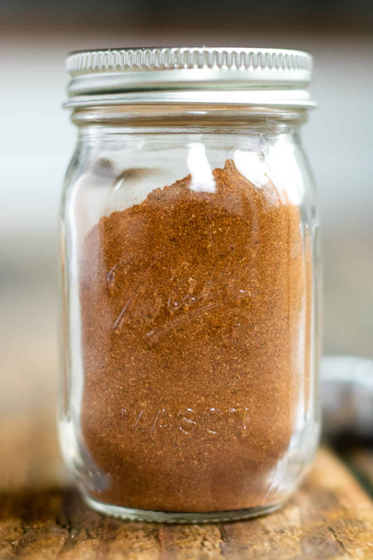 small mason jar with homemade apple pie spice