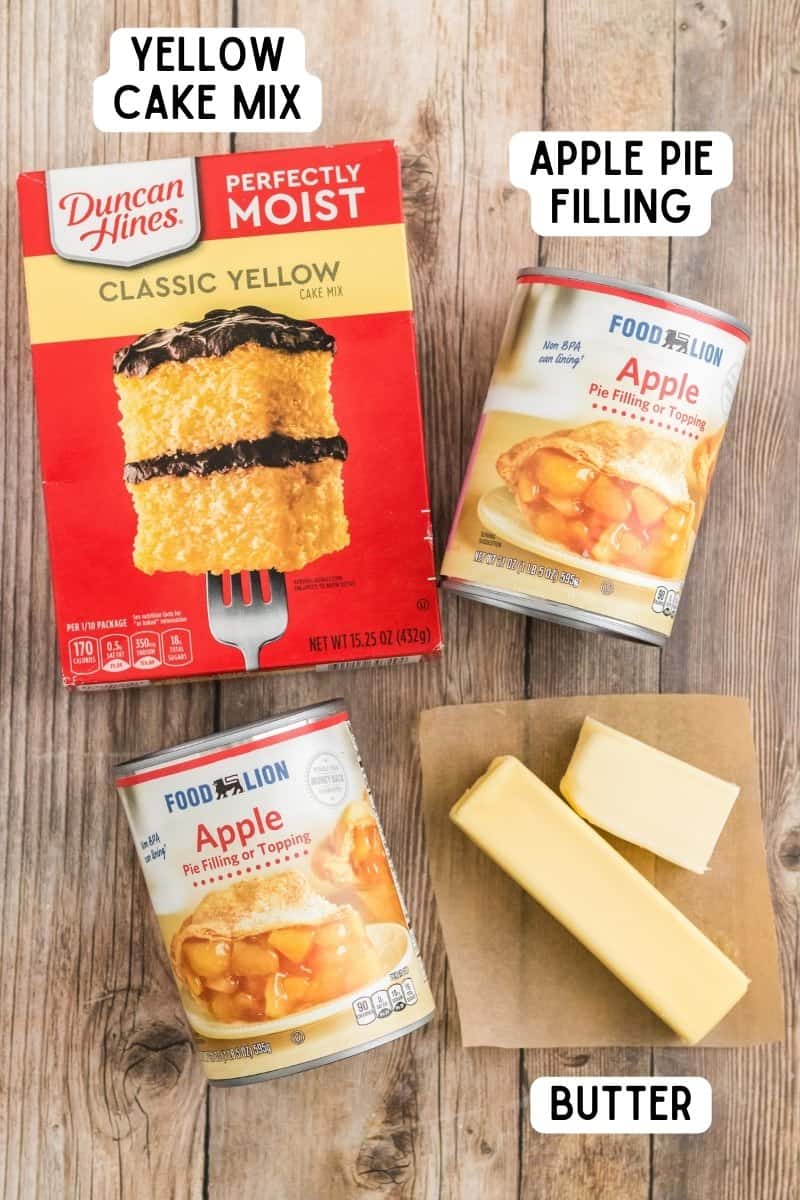 Ingredients for apple dump cake: yellow cake mix, 2 cans of apple pie filling, and butter.