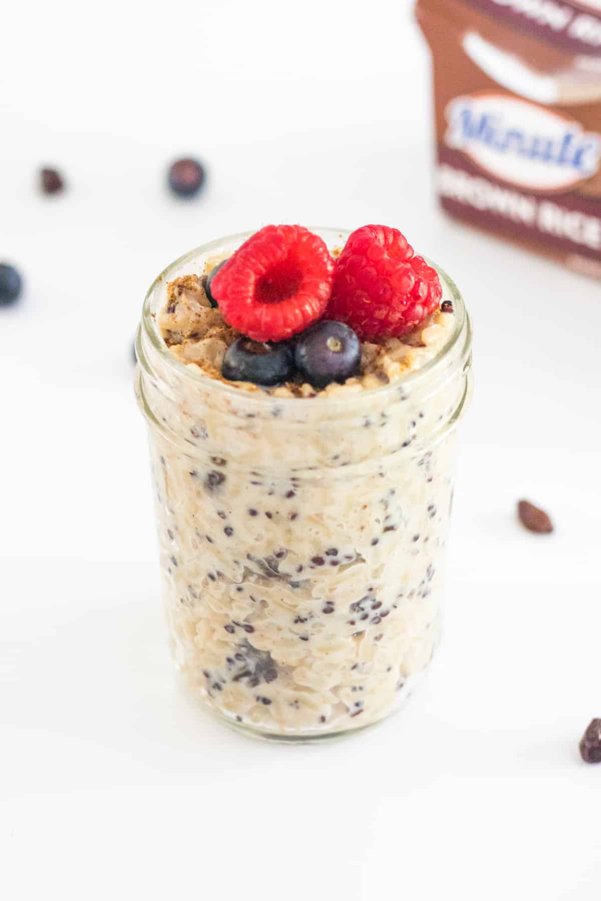 Brown Sugar and Quinoa Rice Pudding topped with fresh berries