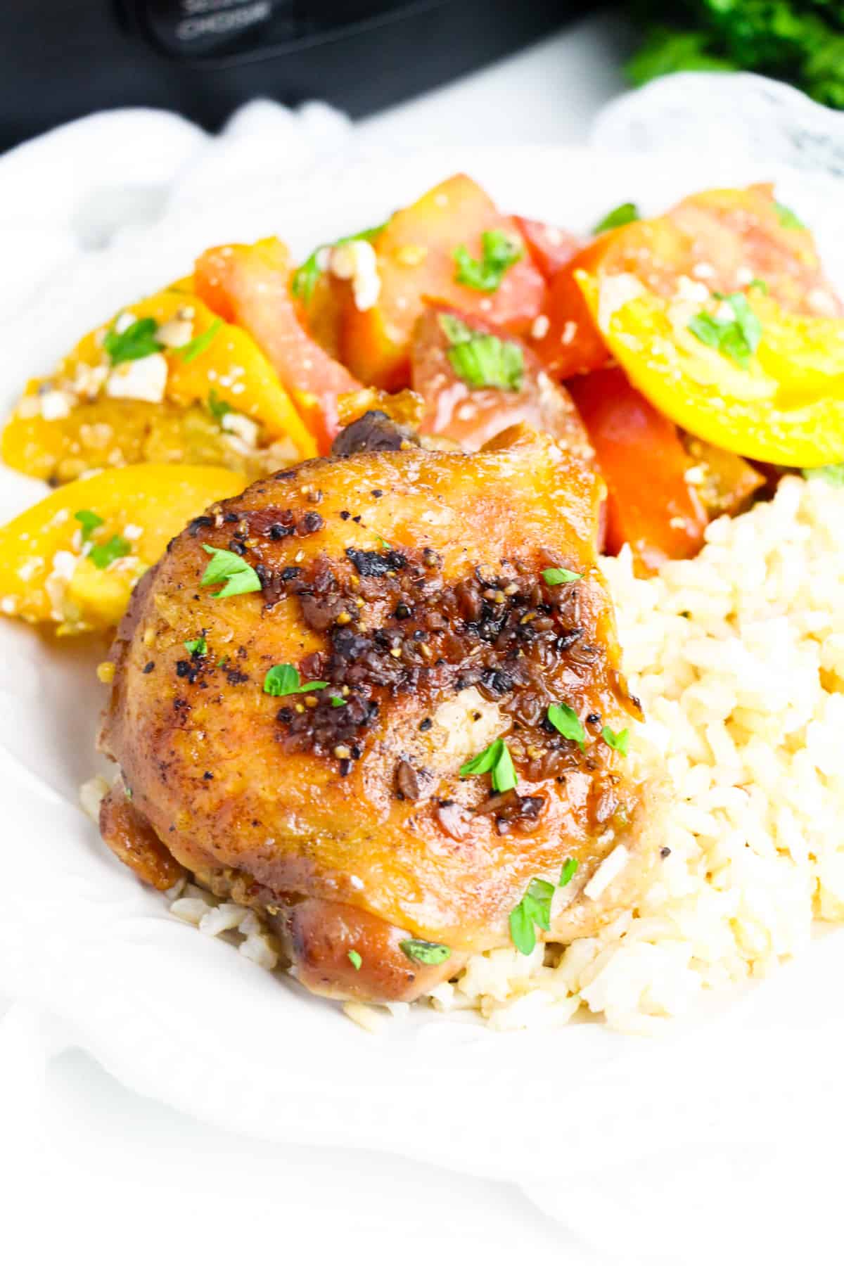 Garlic Brown Sugar Chicken Thigh with rice and tomato salad