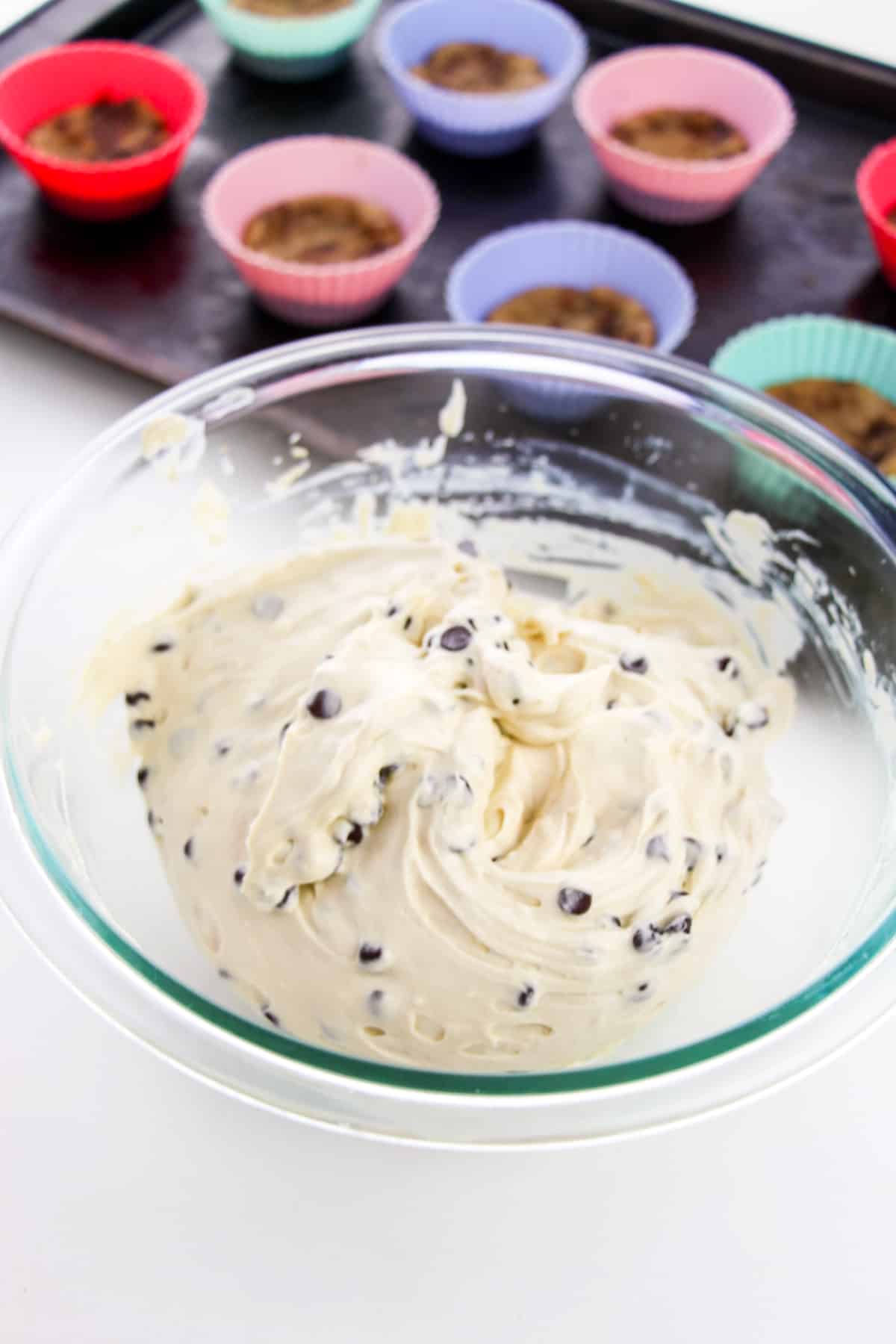 Mixing bowl with creamy no bake chocolate chip cookie dough cheesecake filling