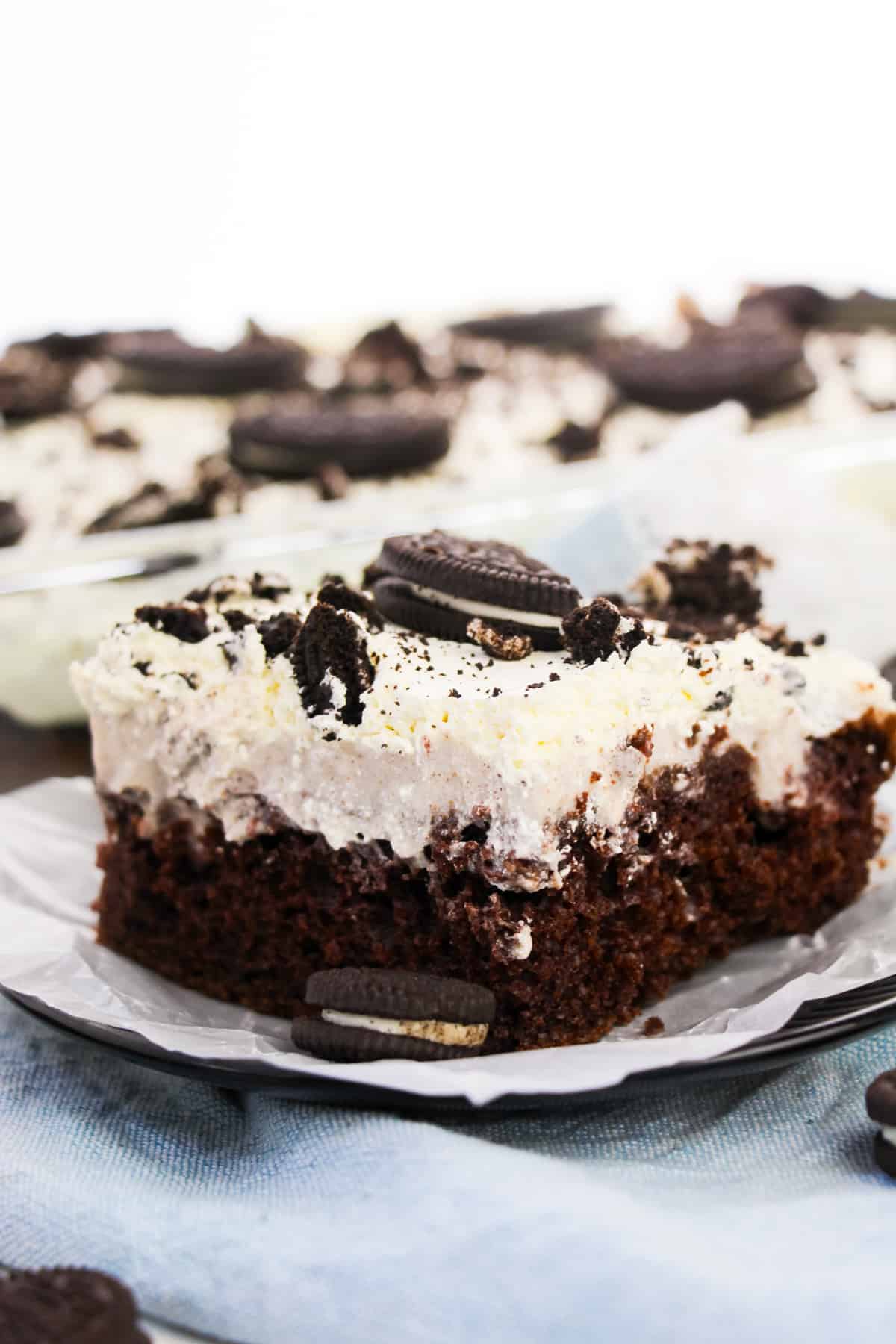 Plate slice of OREO cookie chocolate cake with Cool Whip topping
