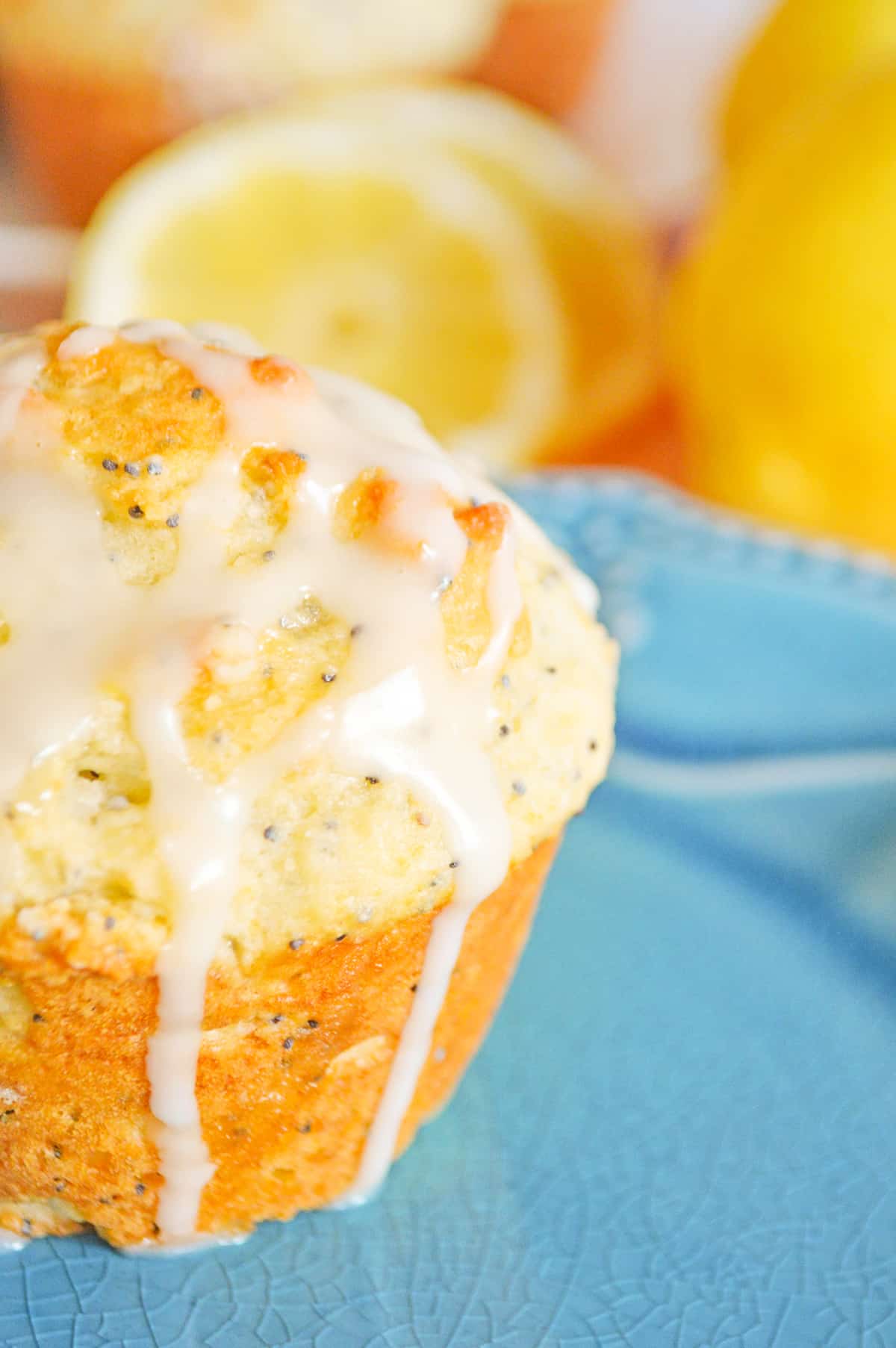 Lemon muffin with glaze and poppy seeds