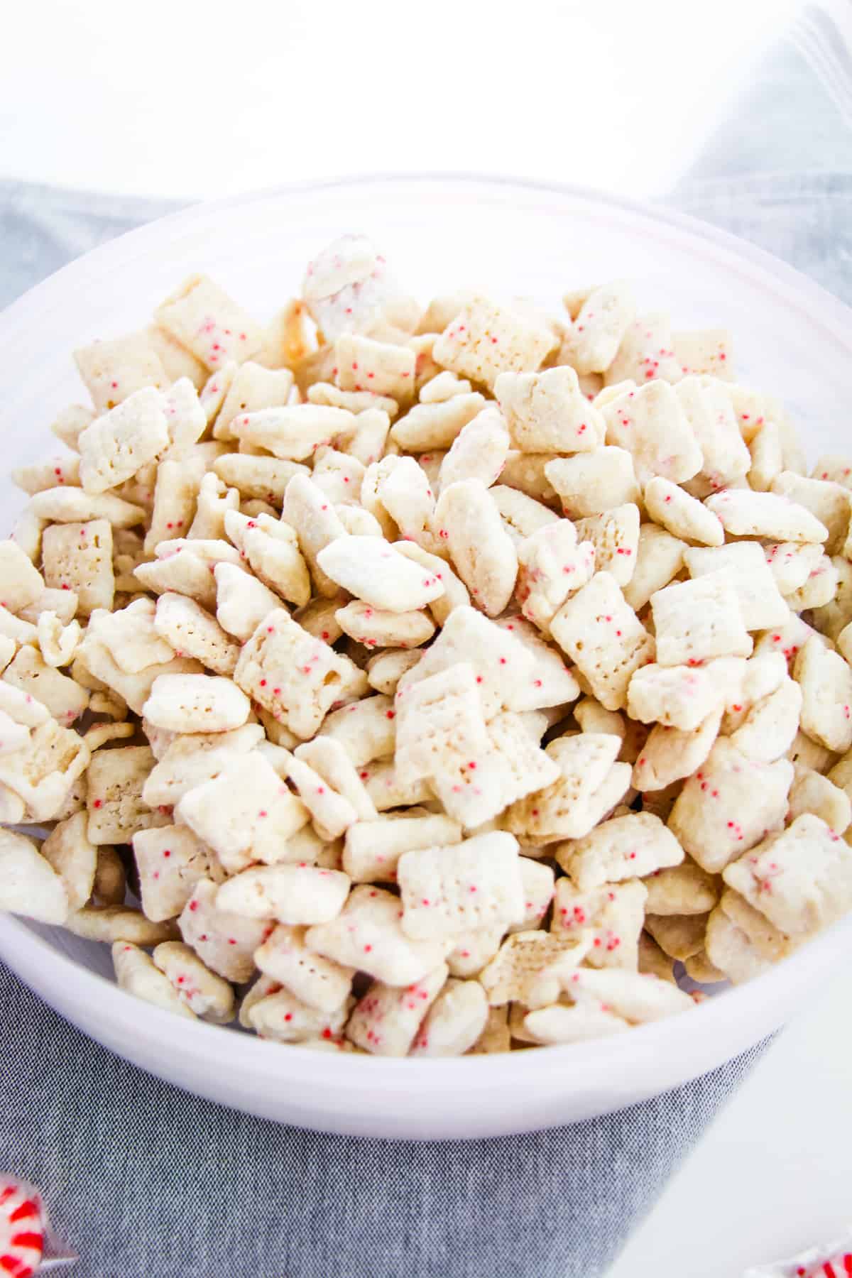 Peppermint muddy buddies in large serving bowl