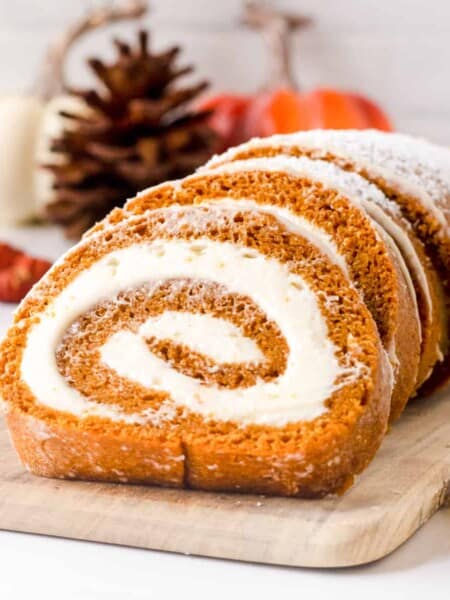 Pumpkin roll cake with cream cheese filling