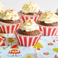 Peppermint mocha cupcakes topped with whipped cream cheese frosting and crushed peppermints