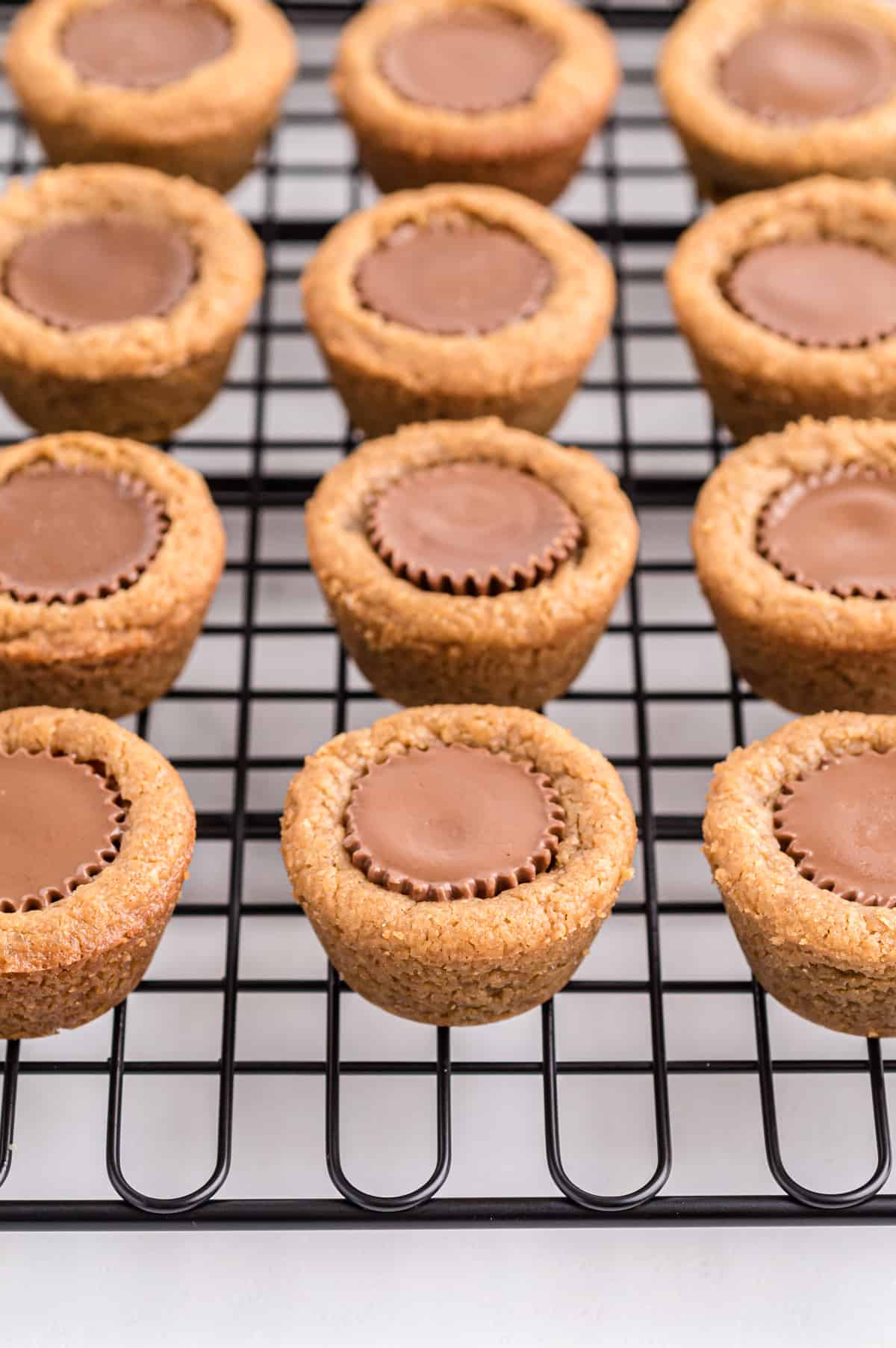 Peanut butter cup cookies on cooling rack