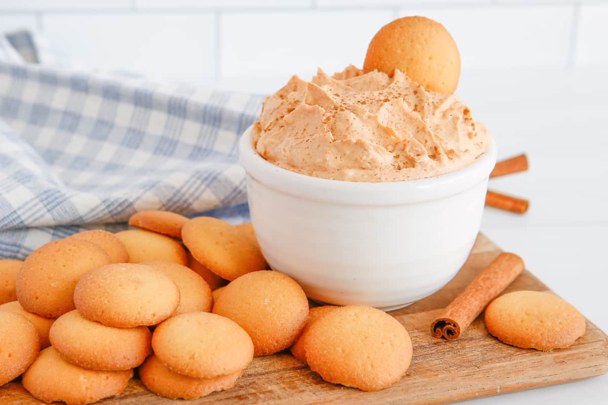 Pumpkin fluff dip served with vanilla cookies for dipping