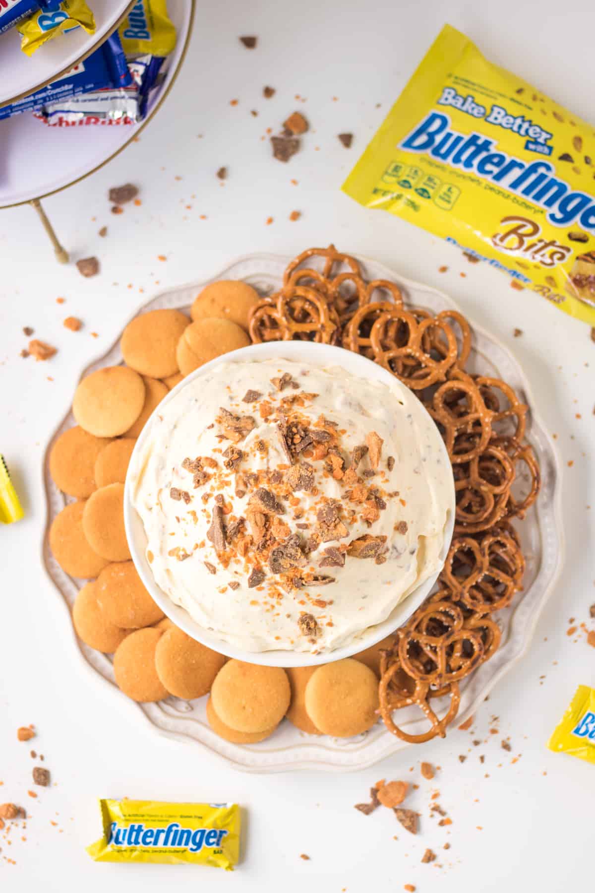 Butterfinger Fluff Dip served with pretzel twists and vanilla wafers for dipping
