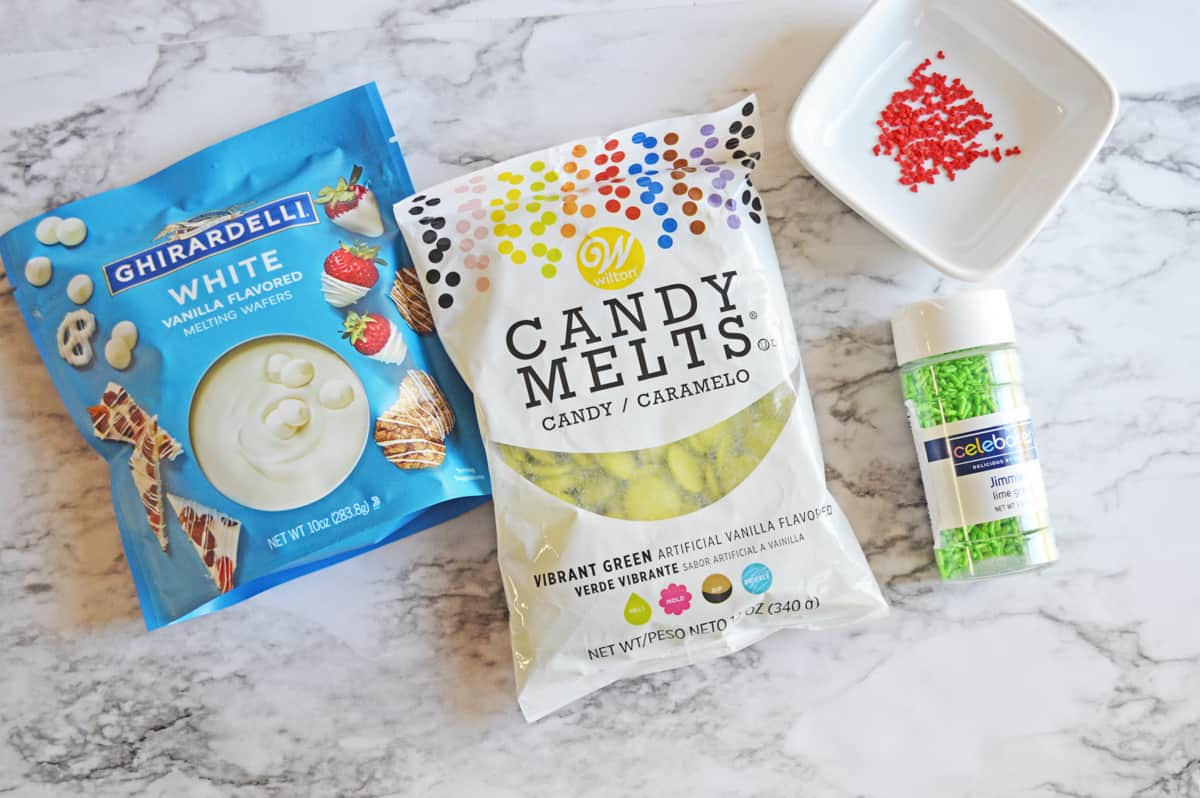Ghirardelli White vanilla melting wafers, Wilton vibrant green candy melts, green sprinkles, red heart sprinkles