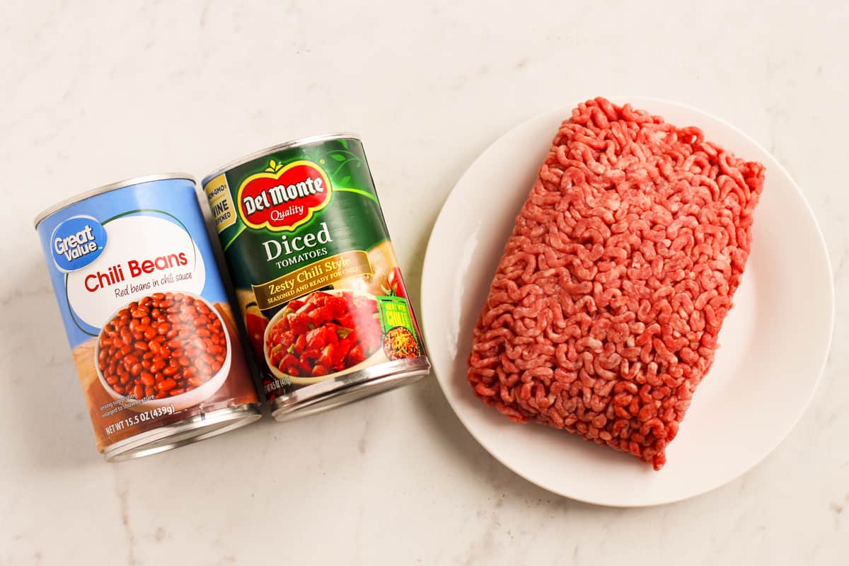 can of chili beans, can of DelMonte chili style diced tomatoes, and a pound of ground beef