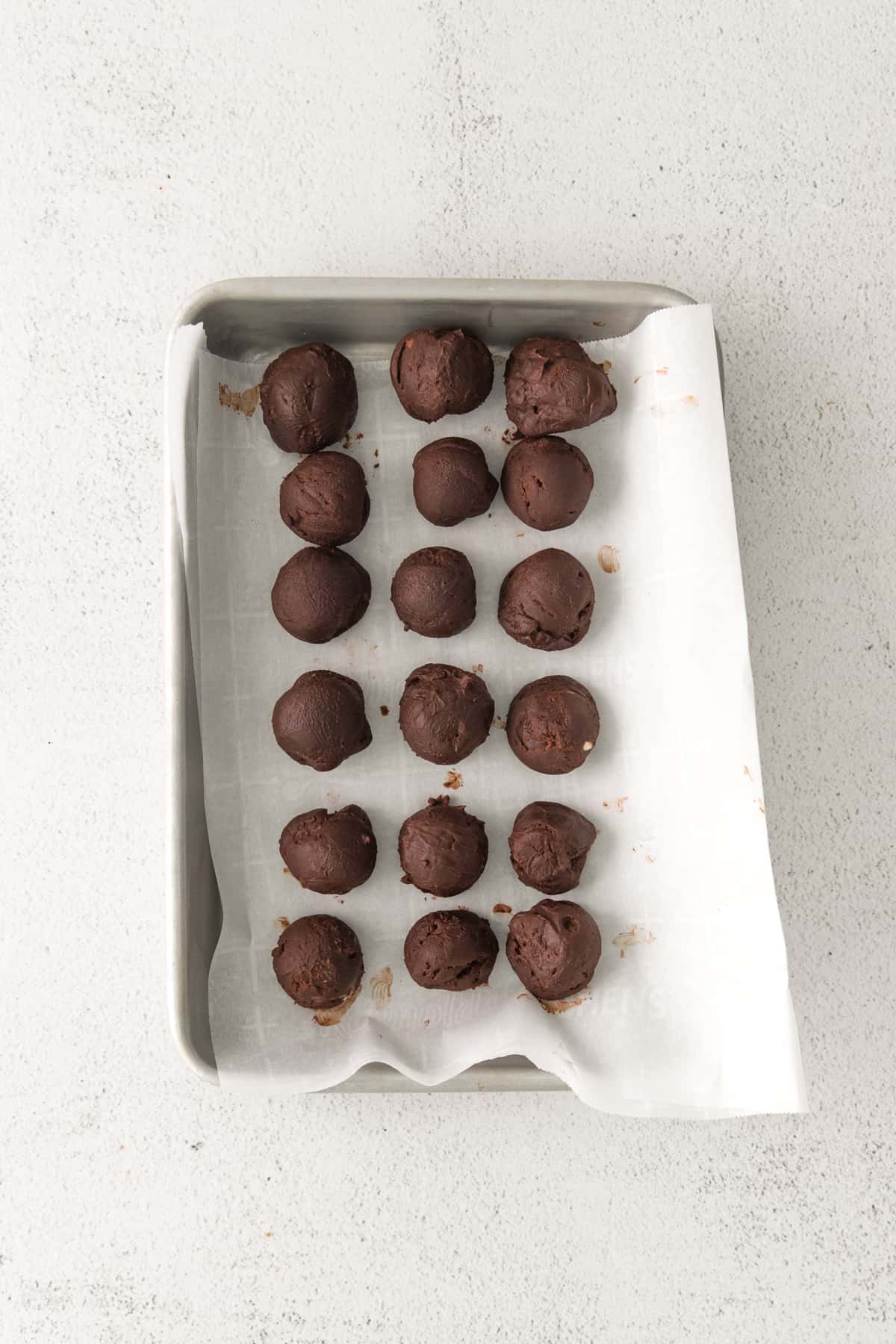Truffles on lined baking sheet